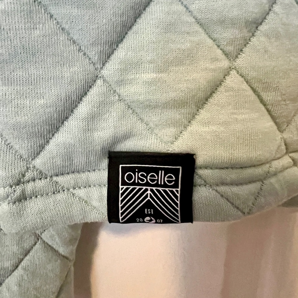 Oiselle Quilted snap Pullover in Soft aqua Green with black trim. XS - Picture 3 of 4